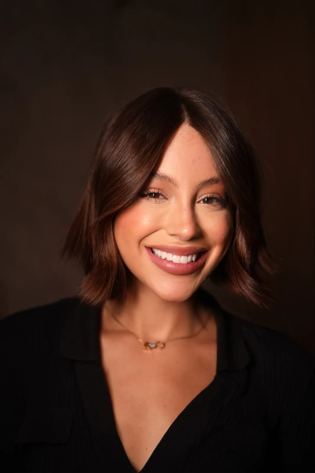 Transformação dental — lentes de porcelana